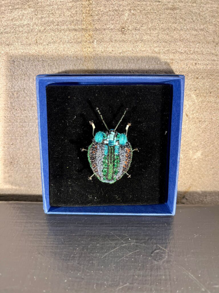 Broche Lead Beetle