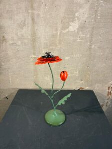 Metalen papaver rood